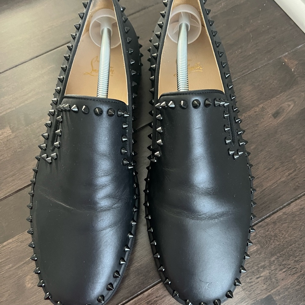 Christian Louboutin black mens loafers with studs. In good condition.